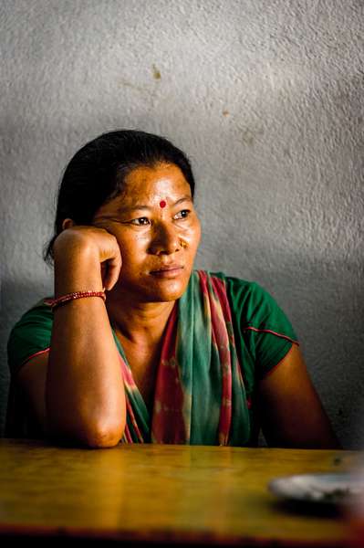 A woman at a rest stop, Nepal